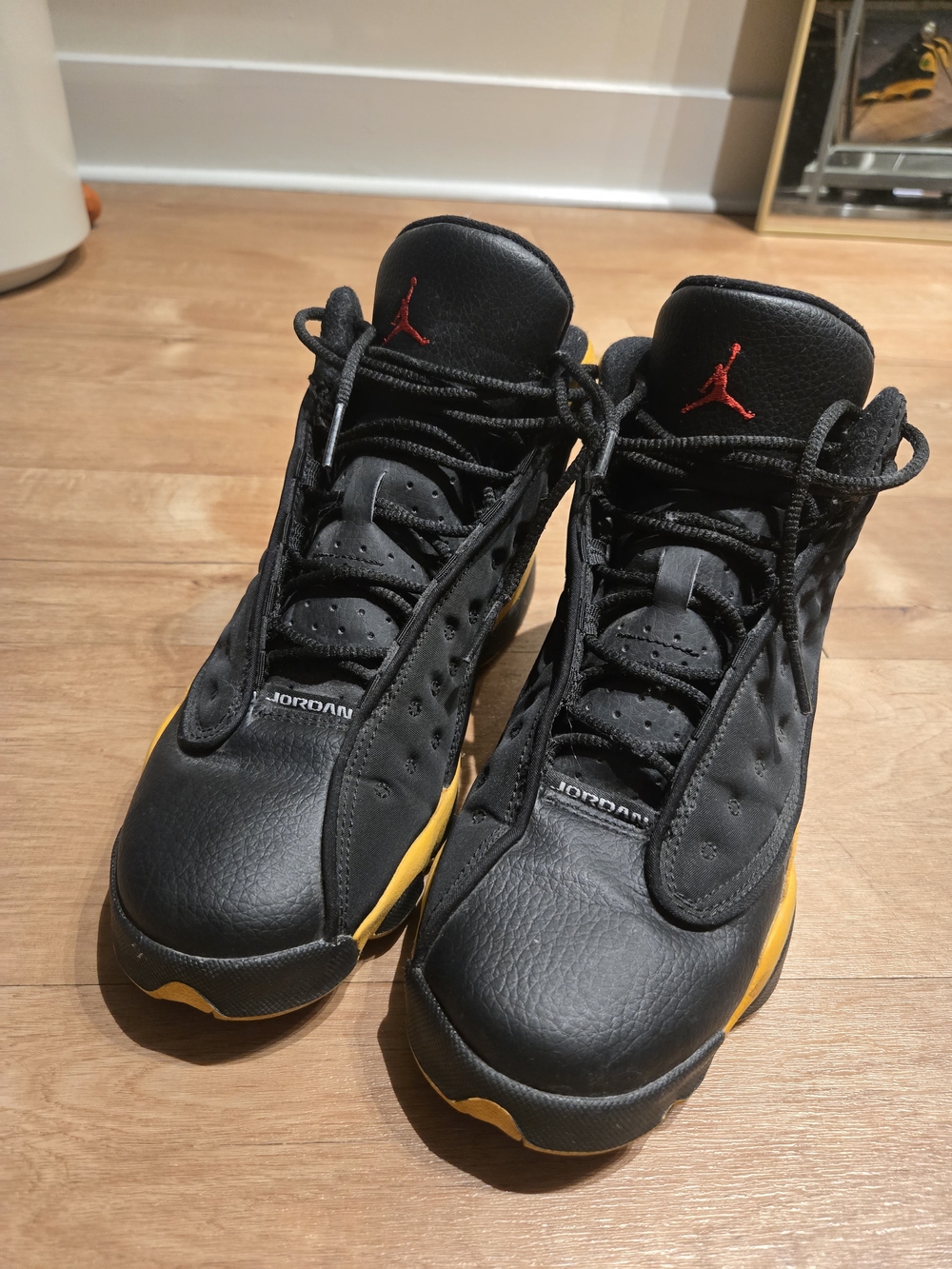 Jordan Black Sneakers with Yellow Accents and Red Jumpman